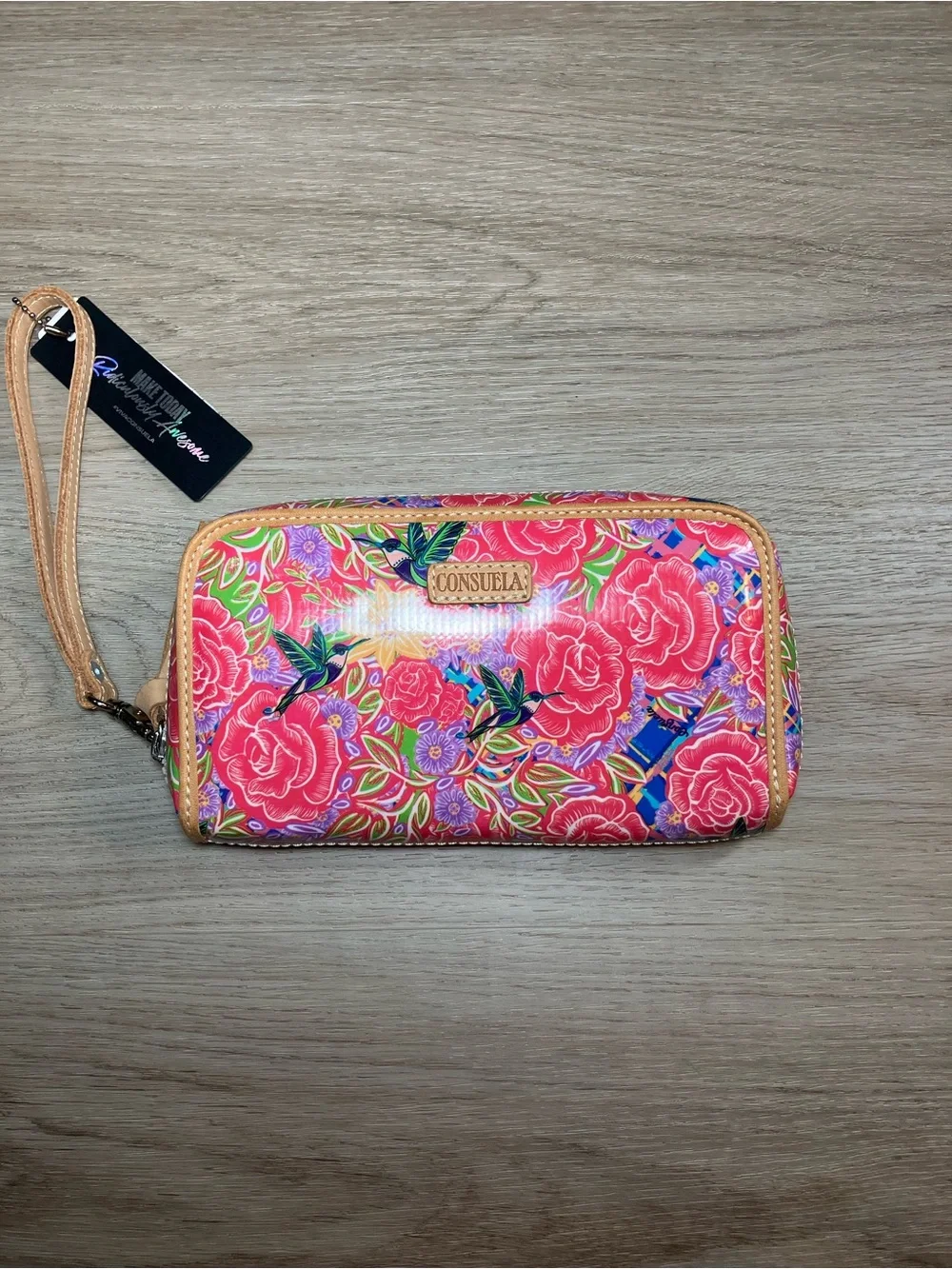 Consuela Pink Floral Embossed Zip Wristlet with Tan Strap